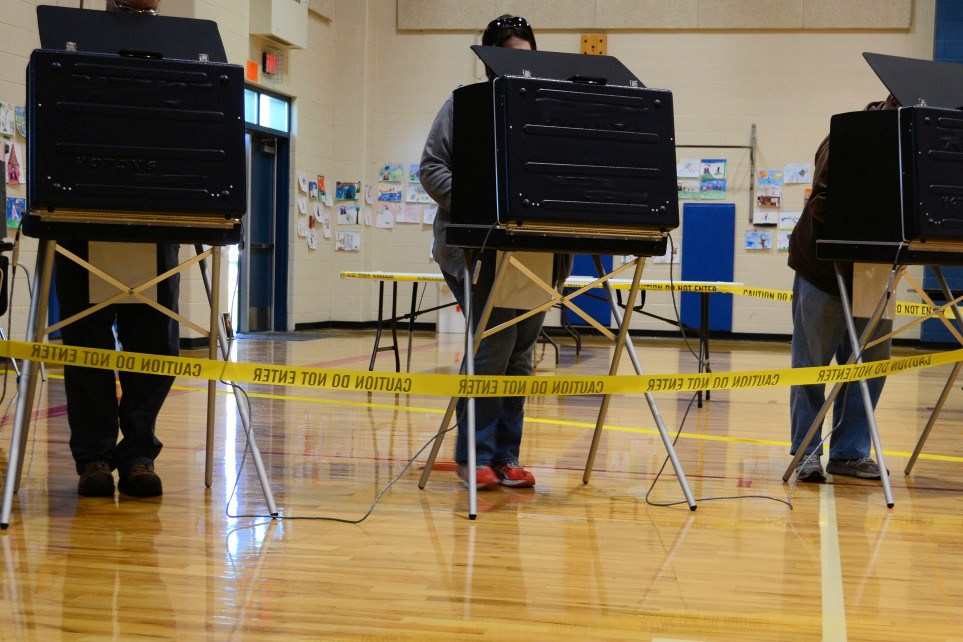 people-using-voting-booths-to-vote-in-an-election-real-people-human-element-voting-booth-polls